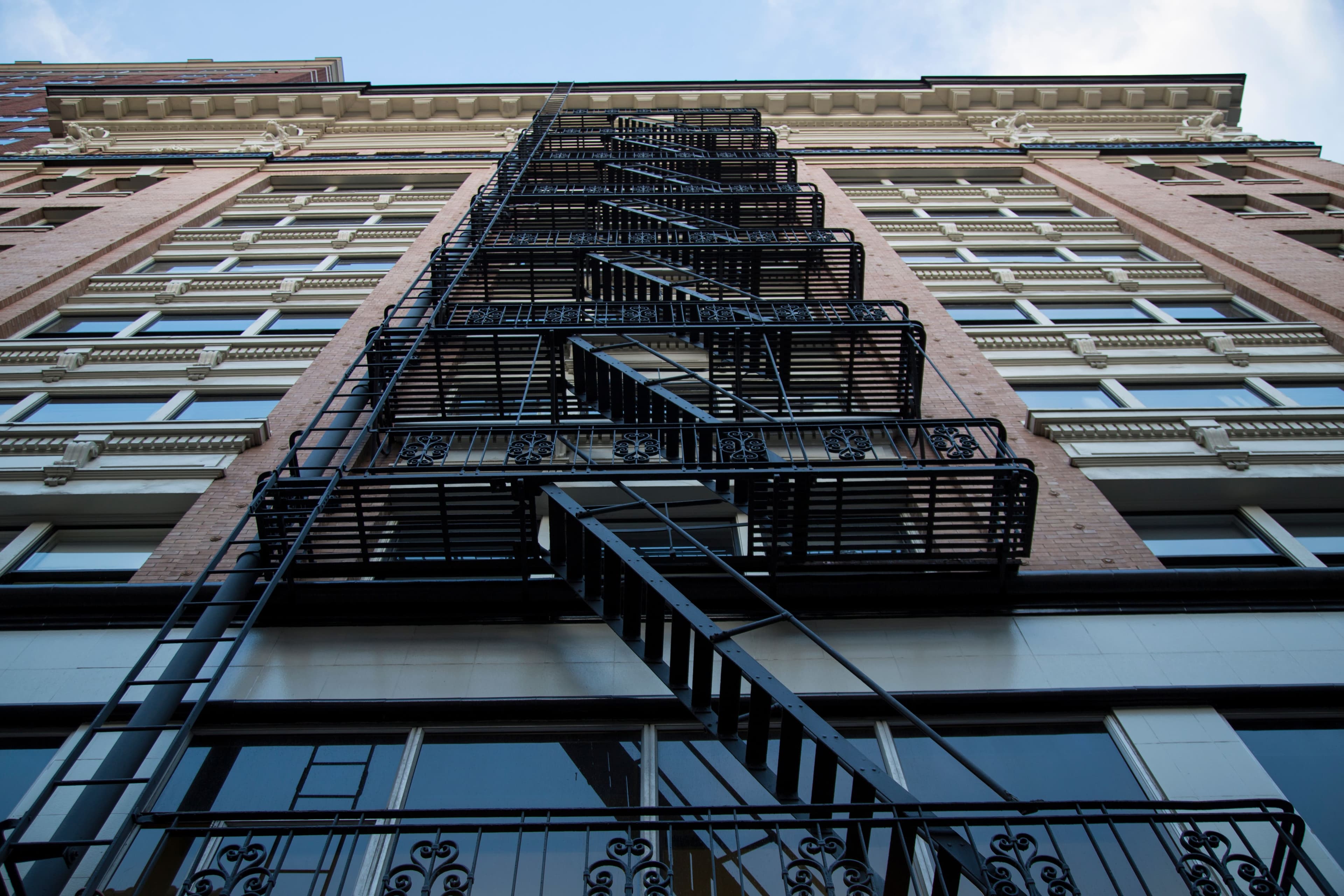 Fire Escape, Metal Railings, and Fence Restoration service by Infinity Construction NYC